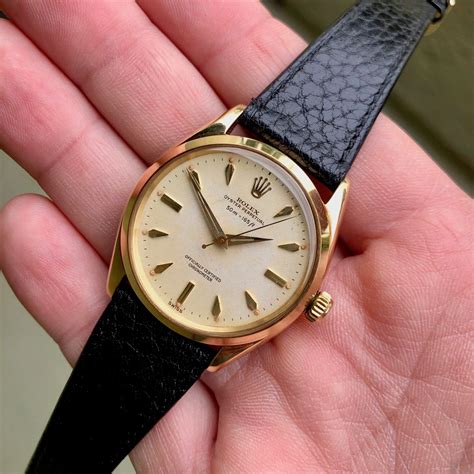 Vintage Rolex Oyster Perpetual 6564 50m = 165ft 18K Yellow 